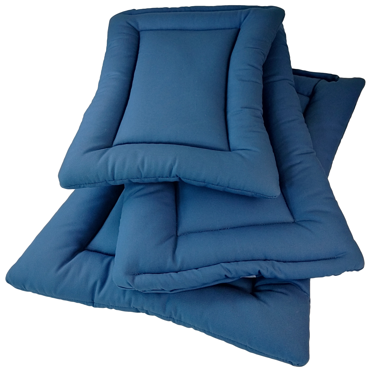 Pile of navy blue colored Organic Cotton Square Dog Beds, organic dog bed