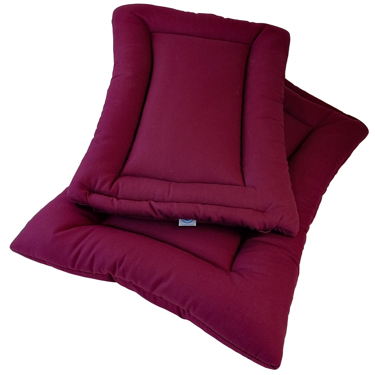 Pile of plum colored Organic Cotton Square Dog Beds, organic dog bed