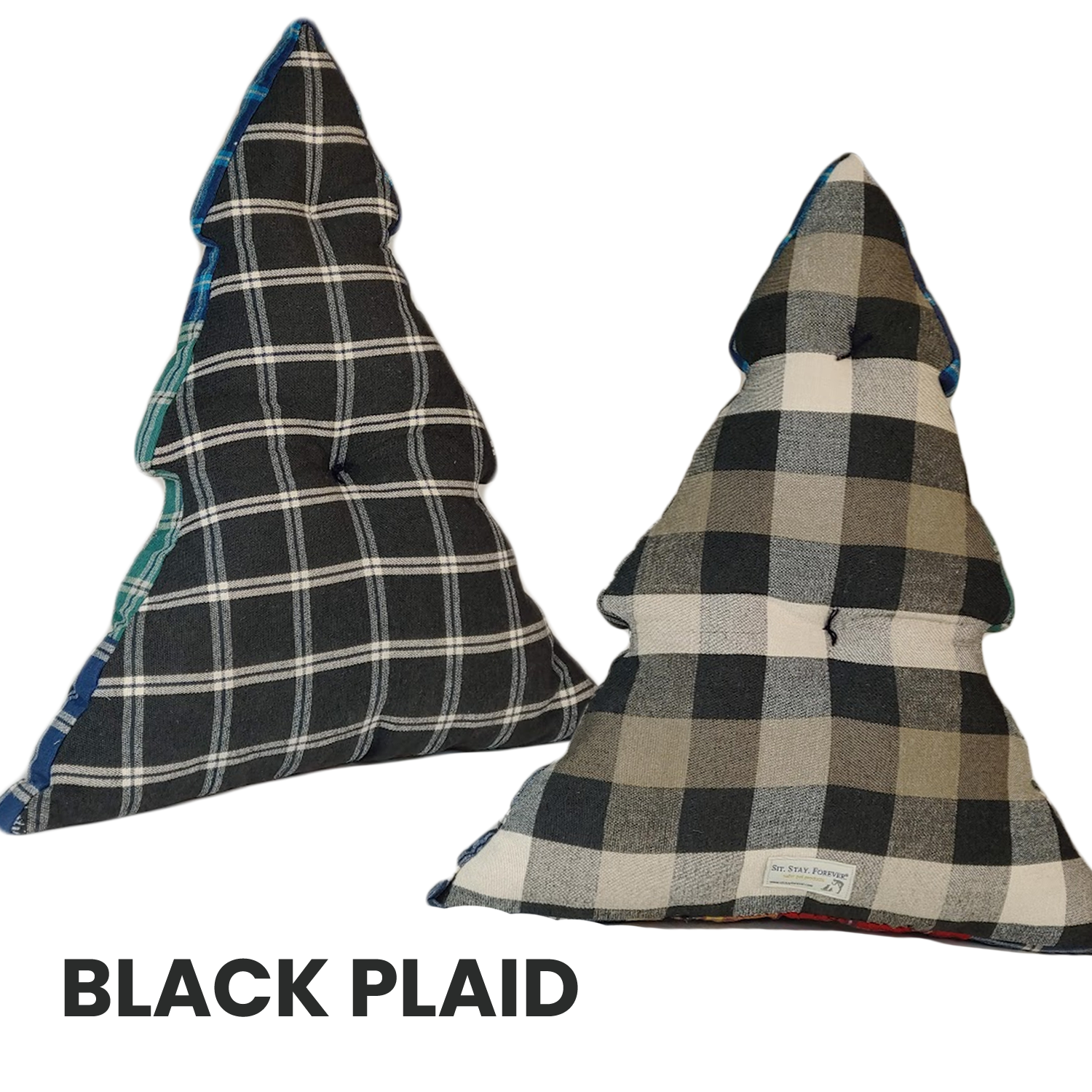 two black plaid holiday tree pillows on white back ground with the copy black plaid