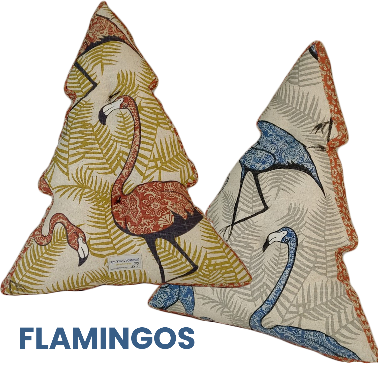 two holiday tree pillows with blue and rust colored flamingos with copy flamingos