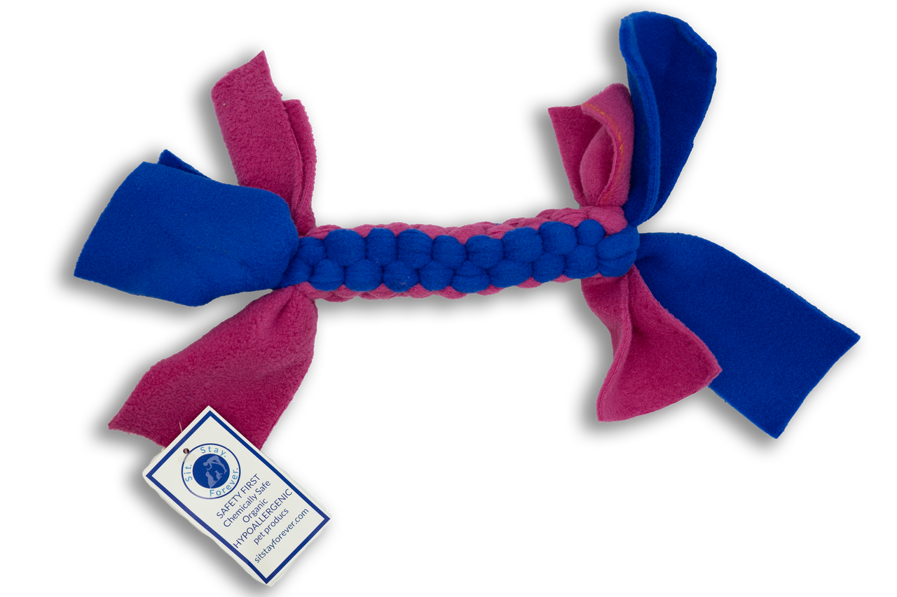 Blue and pink Non-Toxic Braided Dog Toy with labels that read "Safety First. Chemically Safe, Organic, Hypoallergenic pet products" the website for Sit.Stay.Forever is shown as siststayforever.com