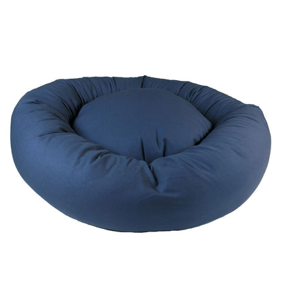 sit stay forever round organic cotton dog bed in the color denim