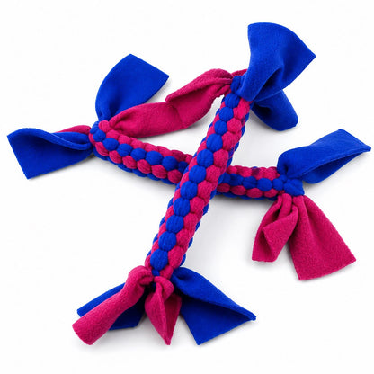 Blue and pink sit stay forever braided dog toy on a white background