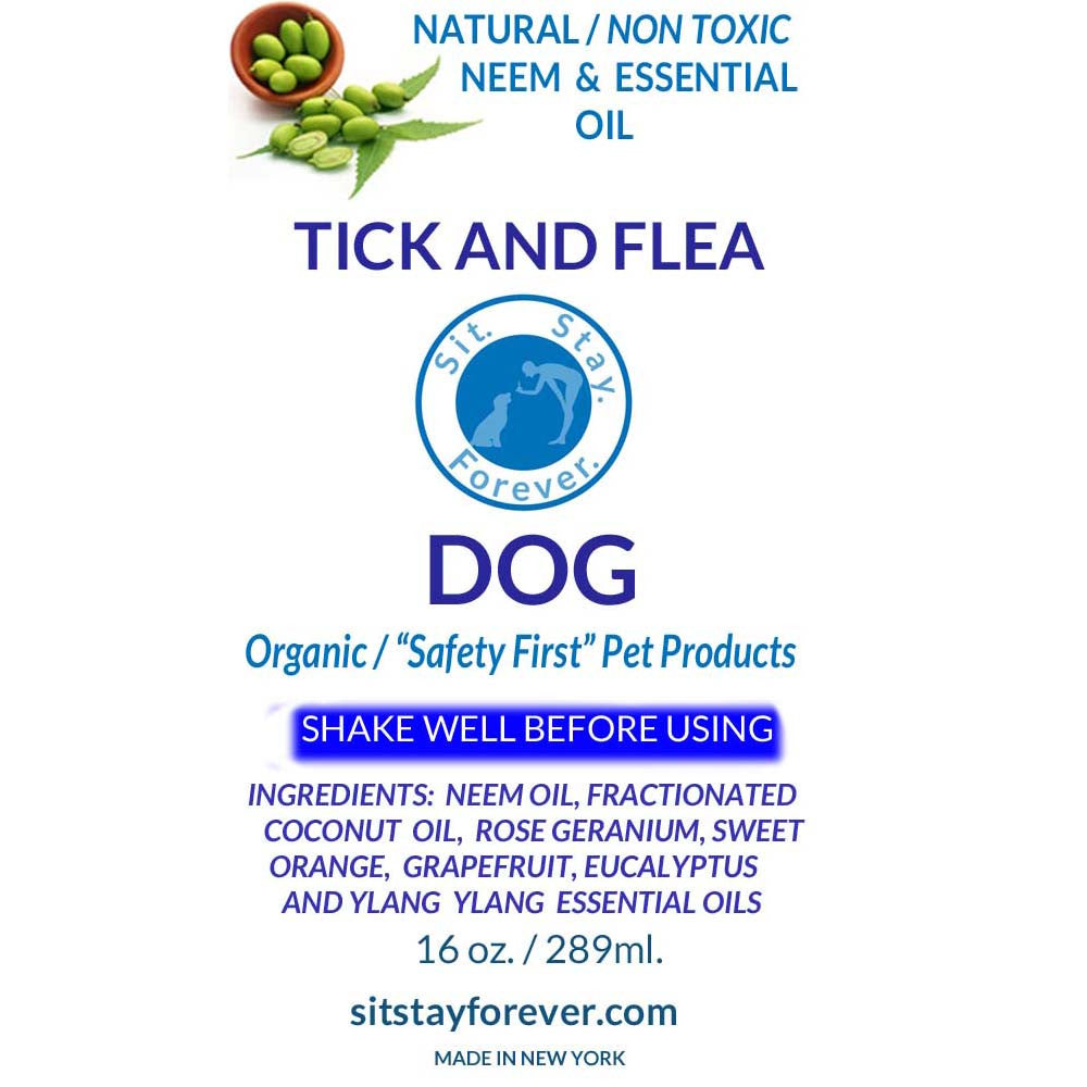 Front label close-up of Sit.Stay.Forever. Tick and Flea spray for dogs. The bottle is 16 oz (289 ml) and features natural, non-toxic neem and essential oil. The label includes the Sit.Stay.Forever. logo and mentions organic "Safety First" Pet Products. Ingredients listed: neem oil, fractionated coconut oil, rose geranium, sweet orange, grapefruit, eucalyptus, and ylang-ylang essential oils.