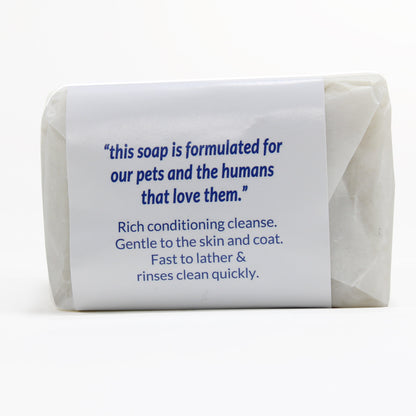 The back label of Sit.Stay.Forever pet soap stating "this soap is formulated for our pets and the humans that love them." It describes the soap as a rich conditioning cleanse, gentle to the skin and coat, fast to lather, and quick to rinse clean.