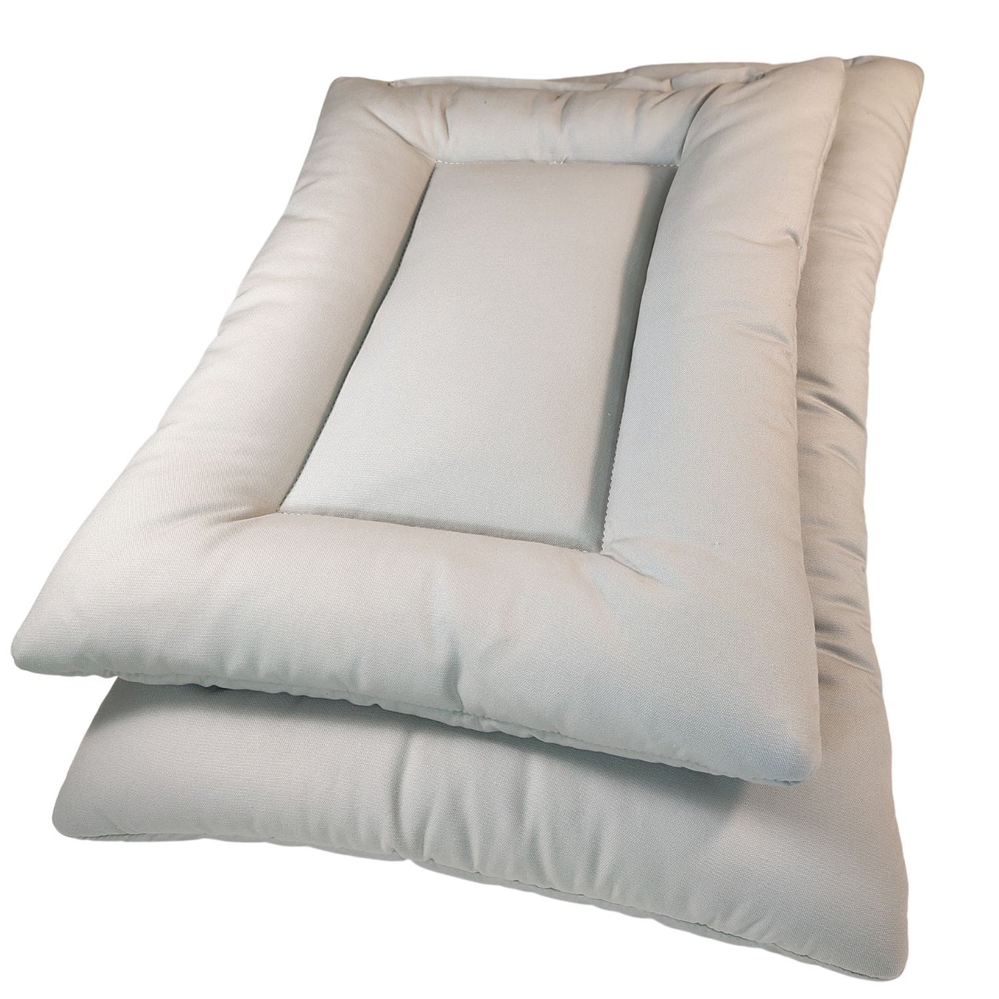 two Sit Stay Forever organic cotton dog beds in the color stone.